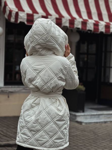 Warm quilted jacket with snap buttons and hood