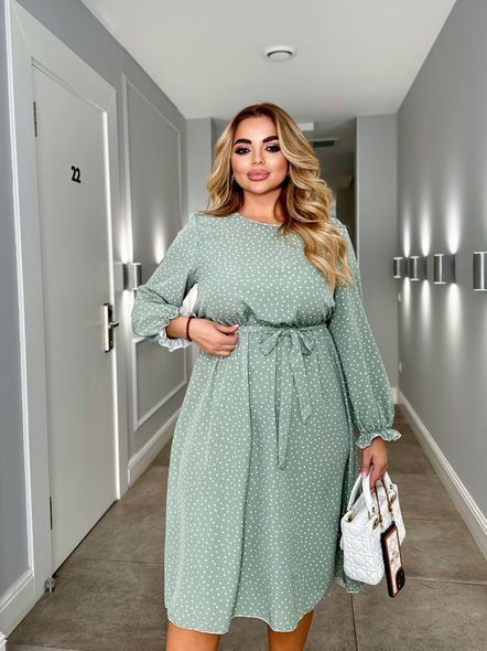 Жіноча сукня вільного крою нижче коліна